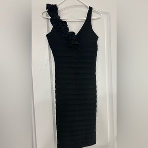 black rushed dress with ruffle detail